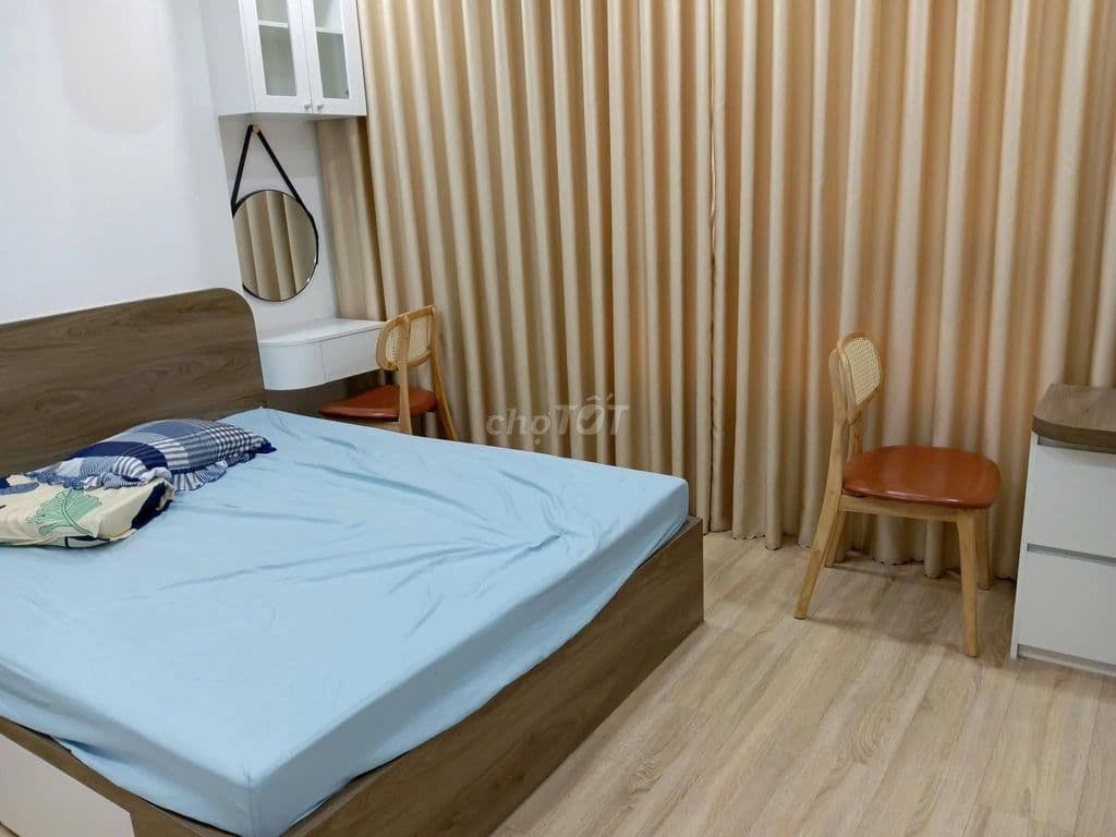Không gian bên trong căn hộ hai phòng ngủ 105 m² tại Carina Plaza