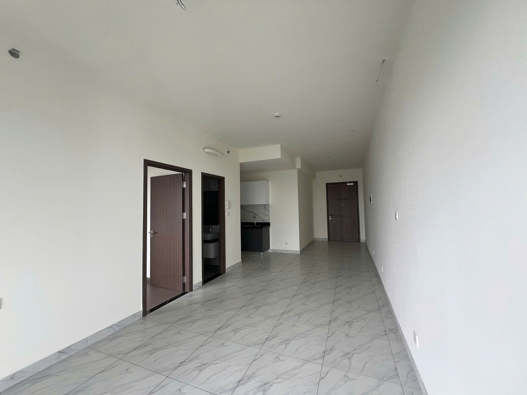 Khu bếp và bàn ăn căn 1 phòng ngủ 55 m² tại The Habitat Bình Dương