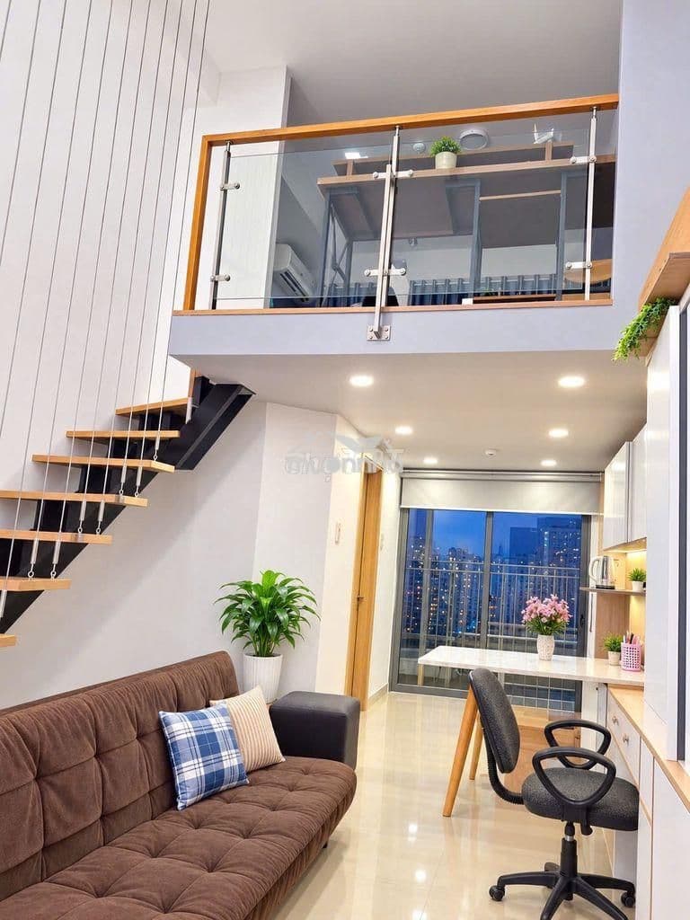 Phòng khách căn 1 phòng ngủ duplex tại La Astoria